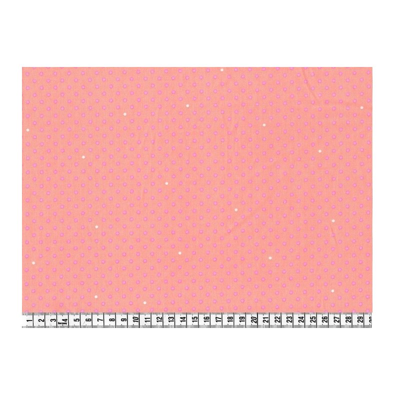 Bomuldsstof med sm� pink prikker p� ferskenfarve